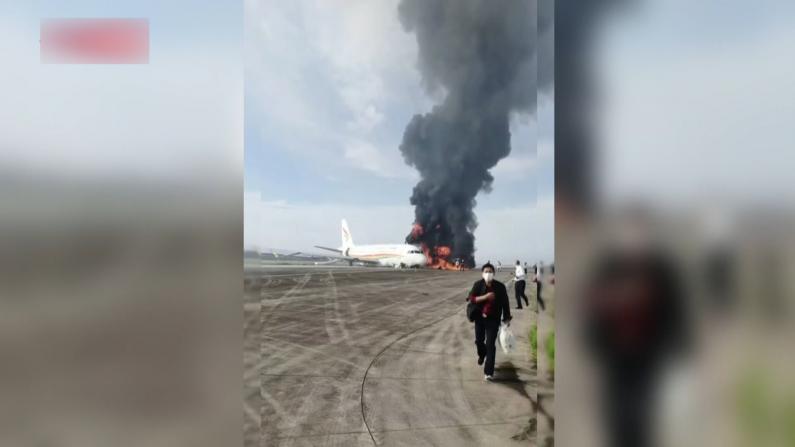 重庆机场客机起飞时冲出跑道起火致40余伤 乘客回忆事发经过