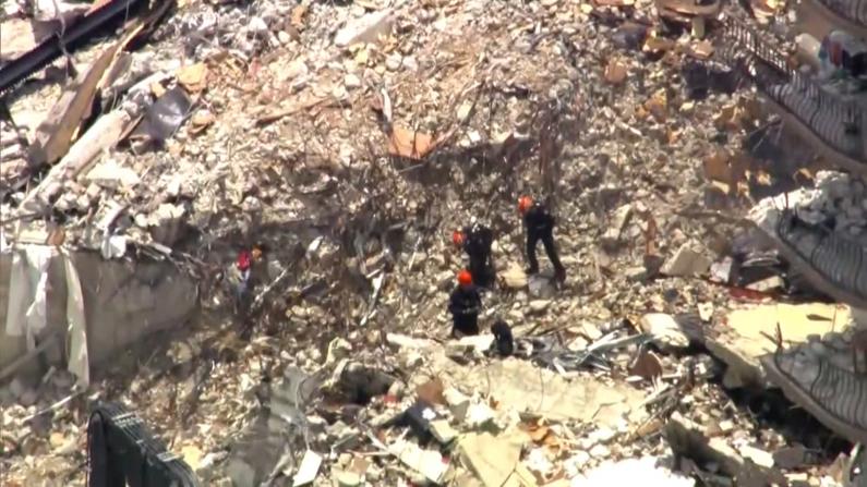 碎砖块坠落拖延迈阿密搜救 专家：幸存者或在16英尺之下
