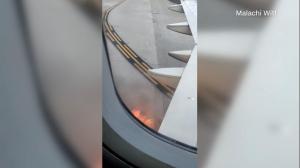 Spirit航班亚特兰大机场起火 乘客拍到这样惊人一幕…