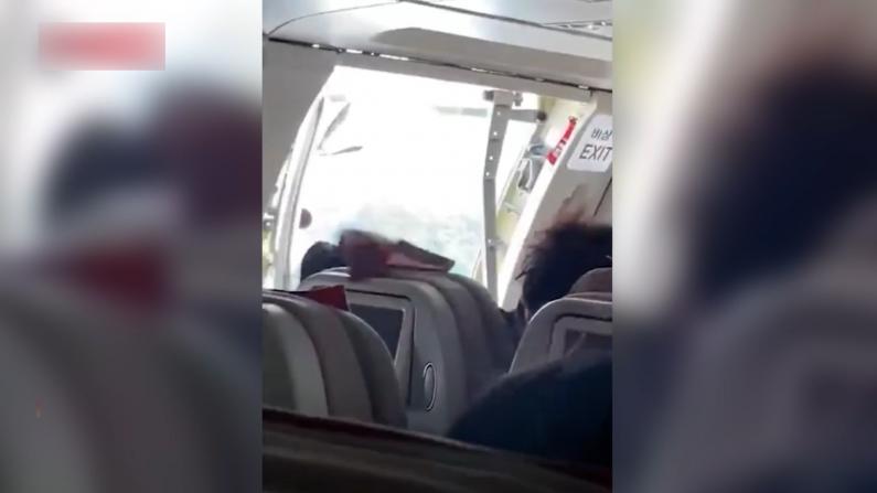 惊魂！韩亚客机空中舱门打开 乘客呼吸困难