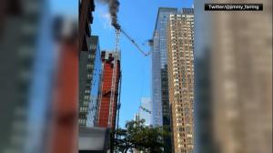 纽约曼哈顿高层塔吊起火倒塌 已致12伤