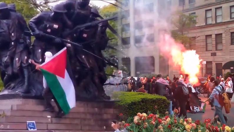 纽约亲巴抗议者破坏一战纪念碑 喷漆又插旗…